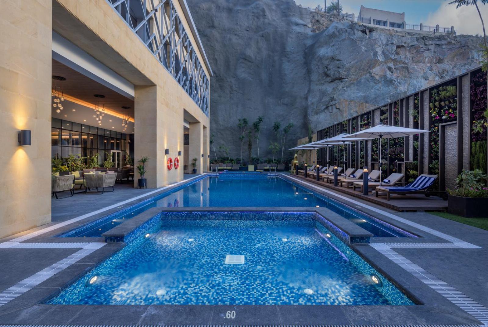 Aparthotel Citadines Abha Extérieur photo Pool at the hotel