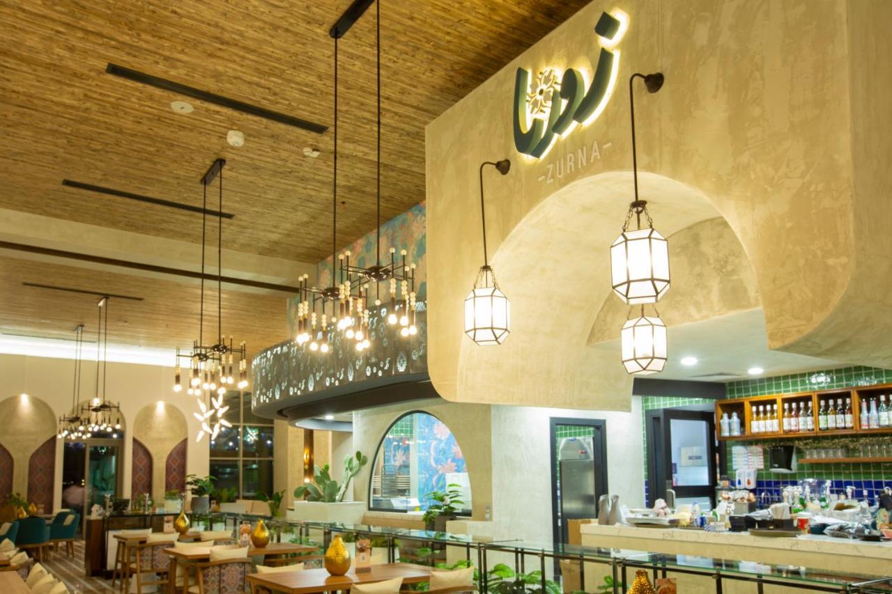 Aparthotel Citadines Abha Extérieur photo Interior of the restaurant