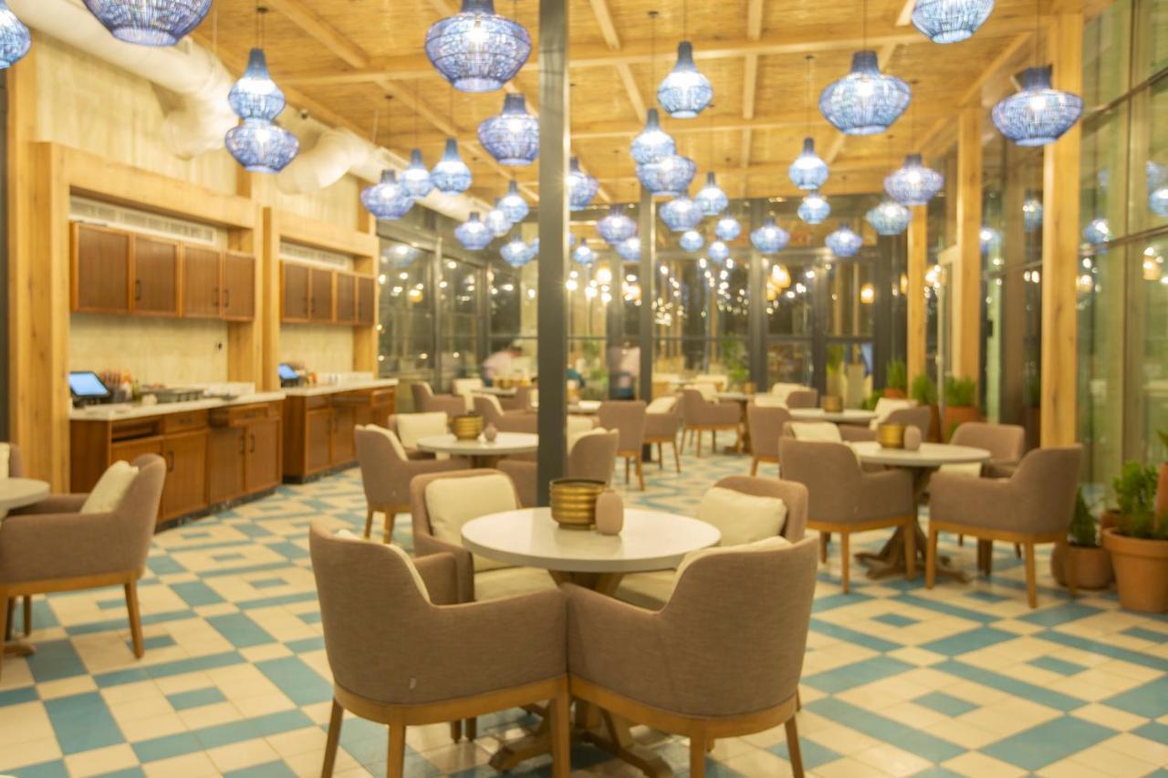 Aparthotel Citadines Abha Extérieur photo The interior of the restaurant